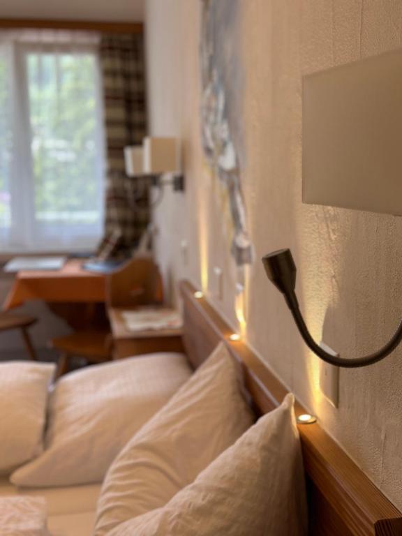 Postel nebo postele na pokoji v ubytování Hotel Acla Filli