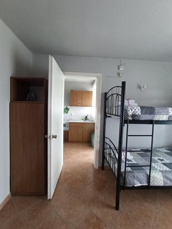 Postel nebo postele na pokoji v ubytování Demis Apartments