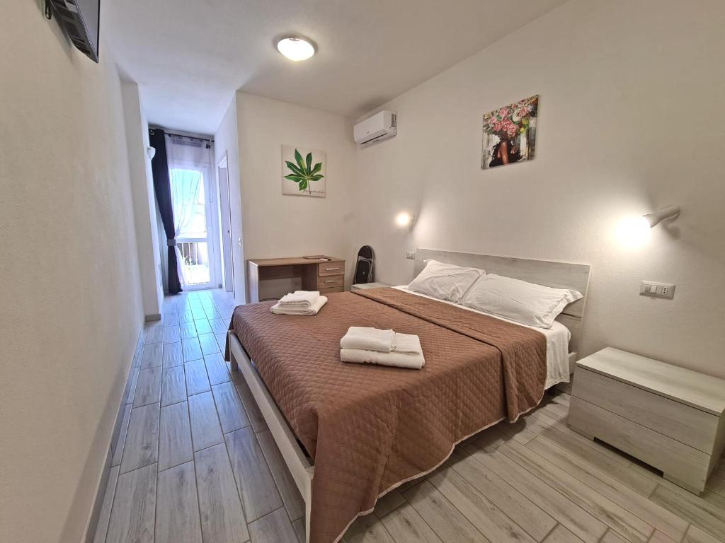 מיטה או מיטות בחדר ב-Civico 14 Apartment 3