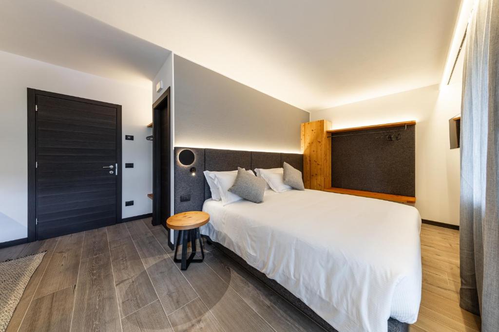 Postel nebo postele na pokoji v ubytování Belsit Apartments