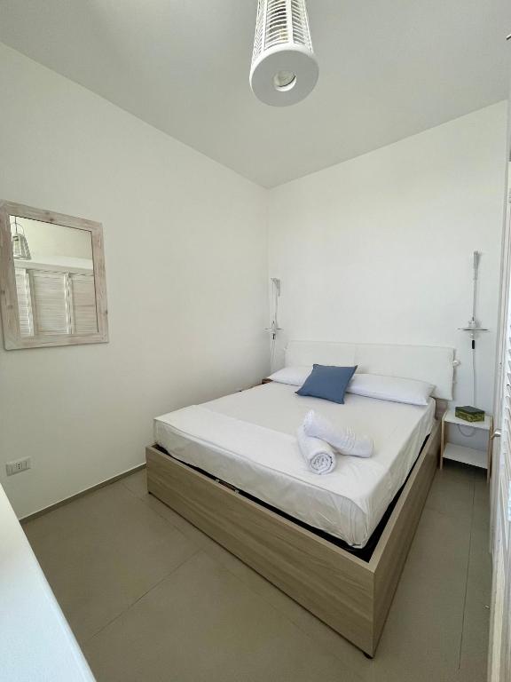 Postel nebo postele na pokoji v ubytování Blue Apartment