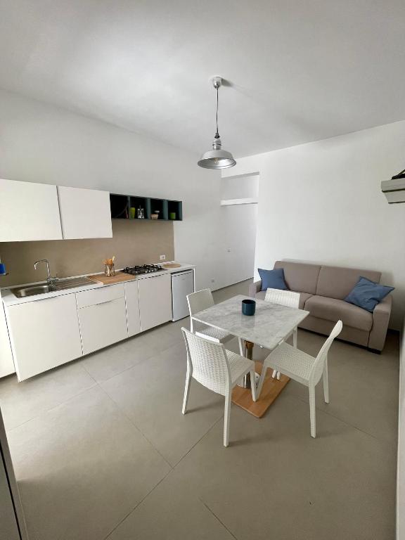 Kuchyň nebo kuchyňský kout v ubytování Blue Apartment