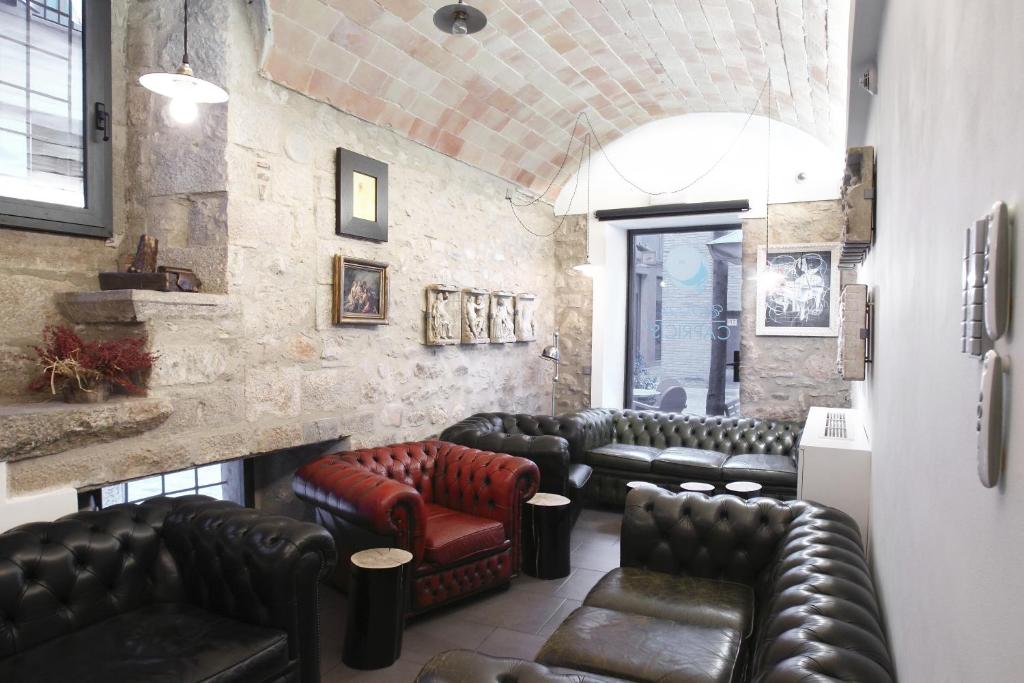 Posezení v ubytování Hotel Museu Llegendes de Girona