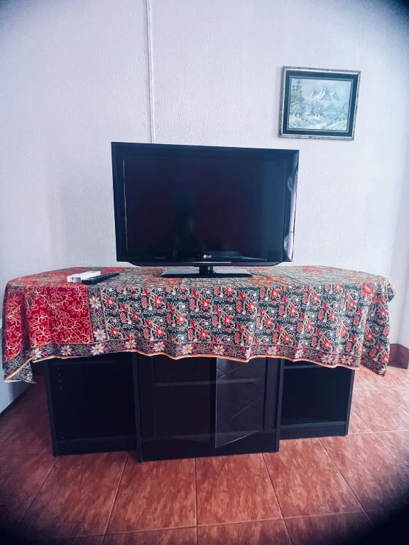 TV a/nebo společenská místnost v ubytování Lucky Banzaan