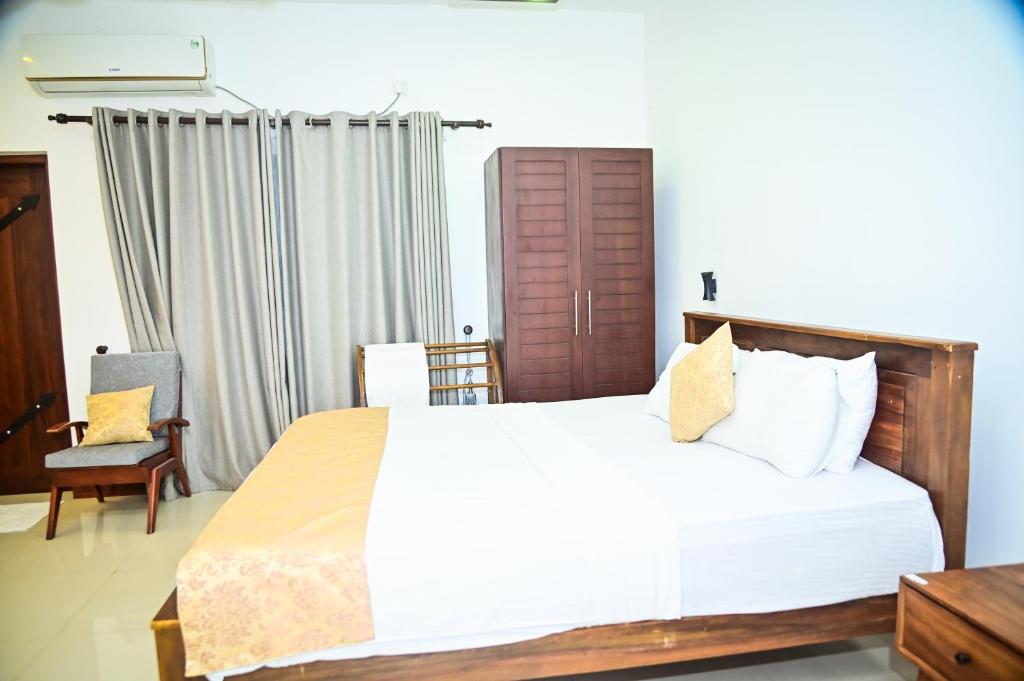 Postel nebo postele na pokoji v ubytování New Sea Villa