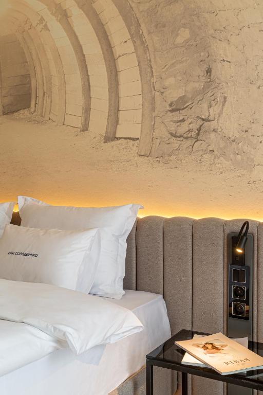 Postel nebo postele na pokoji v ubytování Villa Boutique Hotel