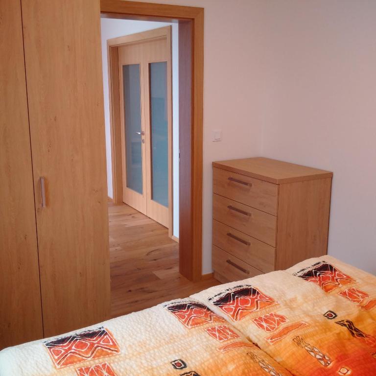 Postel nebo postele na pokoji v ubytování Apartmán u Skiareálu Filipovice