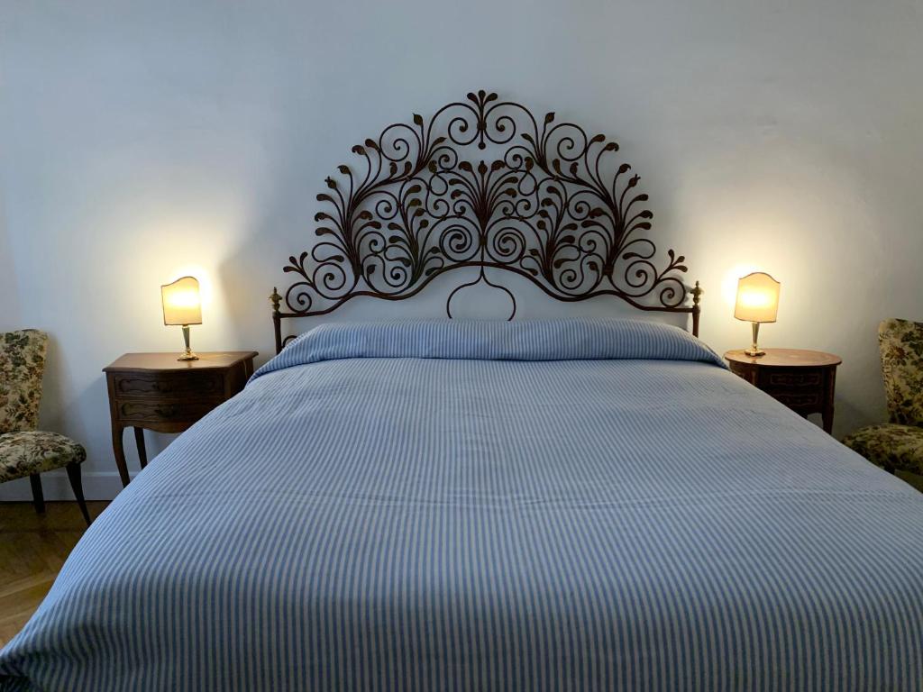 Cama ou camas em um quarto em Charming renovated apartment in Turin- 2 Bathrooms