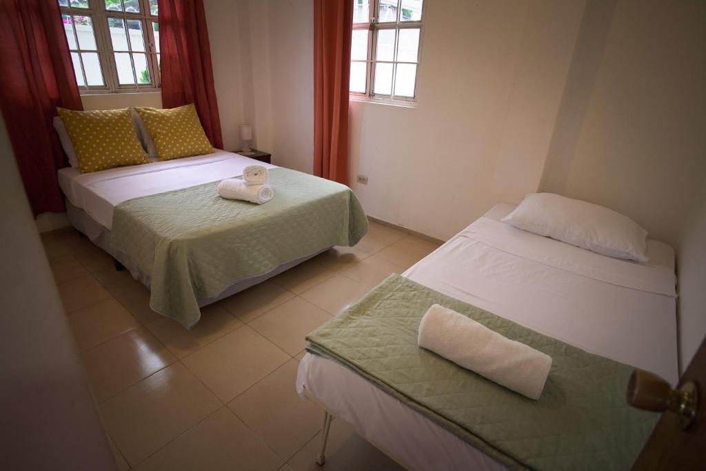 Postel nebo postele na pokoji v ubytování Kilian Beach House