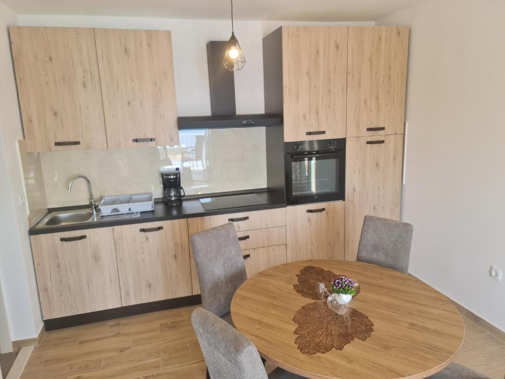 Kuchyň nebo kuchyňský kout v ubytování Apartments Pavlić