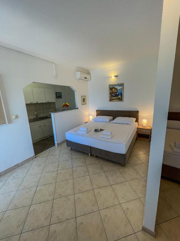 Postel nebo postele na pokoji v ubytování Villa Sunce