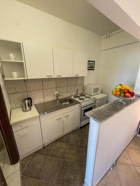 Kuchyň nebo kuchyňský kout v ubytování Villa Sunce