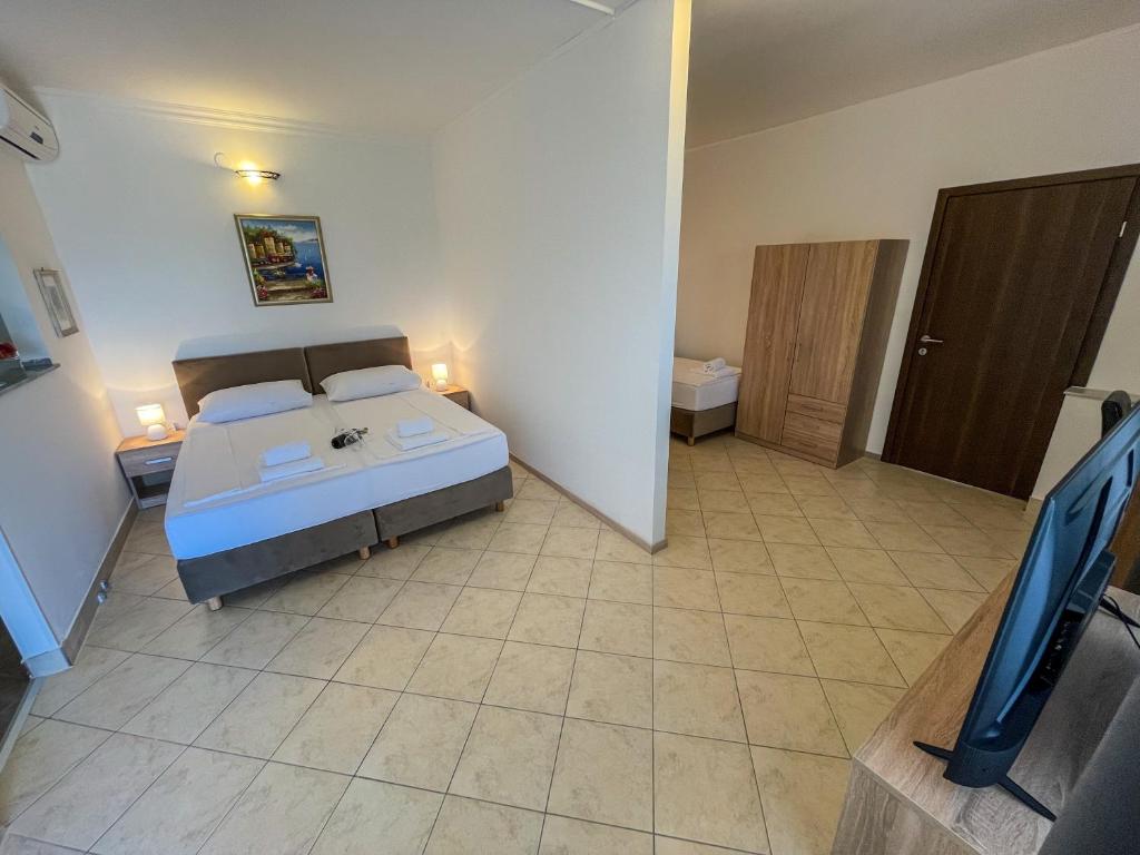 Postel nebo postele na pokoji v ubytování Villa Sunce