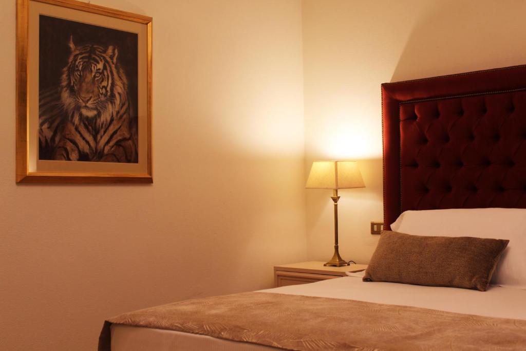 Postel nebo postele na pokoji v ubytování VillaMara Luxury rooms