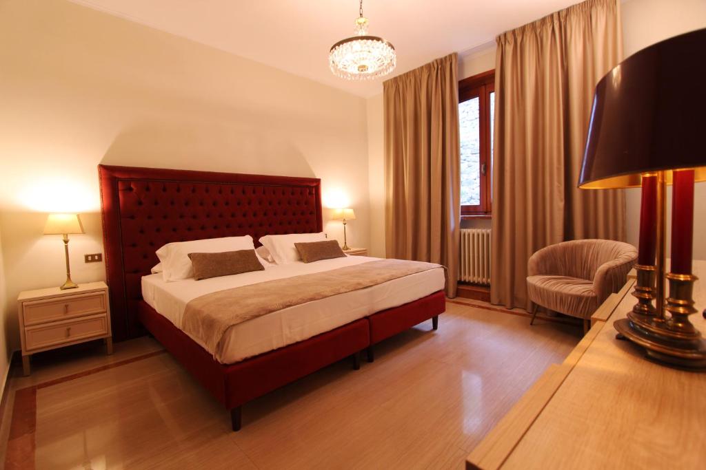 Postel nebo postele na pokoji v ubytování VillaMara Luxury rooms