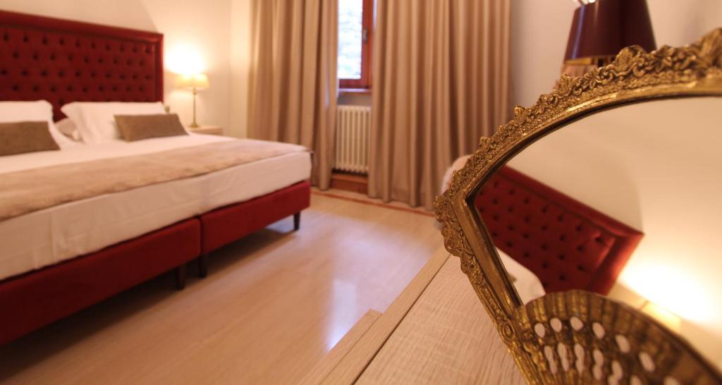 Postel nebo postele na pokoji v ubytování VillaMara Luxury rooms