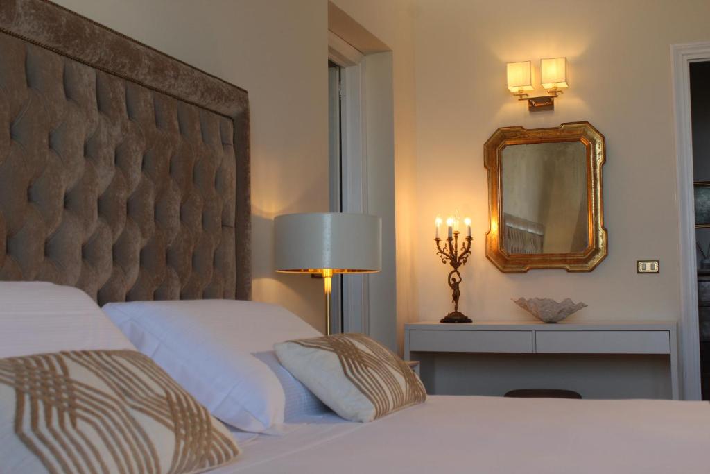 Postel nebo postele na pokoji v ubytování VillaMara Luxury rooms