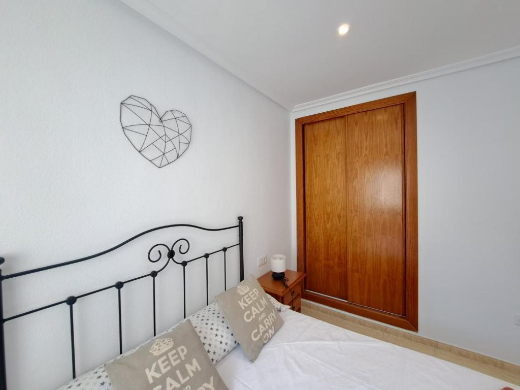 Postel nebo postele na pokoji v ubytování Apartamento Torremar Natura - Vera Playa Zona Naturista