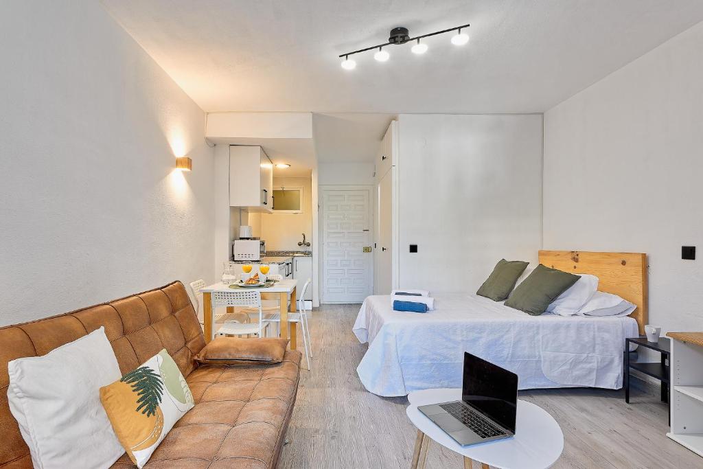 Posedenie v ubytovaní Lovely Home Estudio Jupiter Piscina