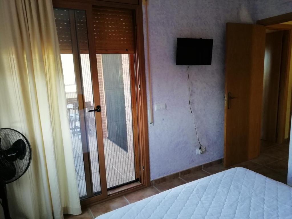 Postel nebo postele na pokoji v ubytování Mari & Jose Ramon Casa 10 personas - 7 adultos max