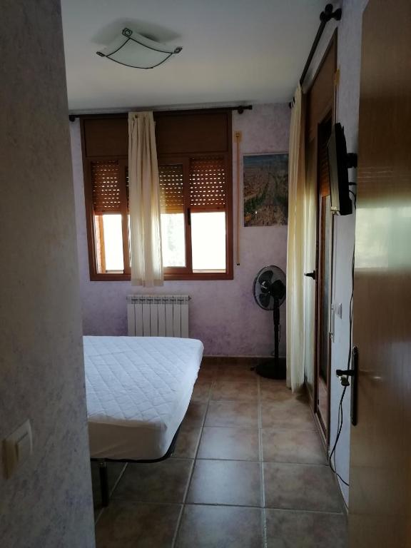 Postel nebo postele na pokoji v ubytování Mari & Jose Ramon Casa 10 personas - 7 adultos max