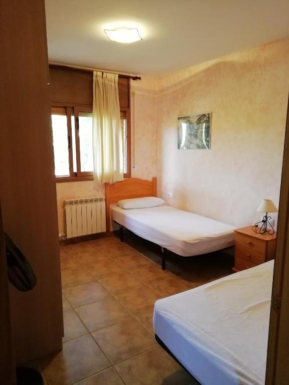 Postel nebo postele na pokoji v ubytování Mari & Jose Ramon Casa 10 personas - 7 adultos max