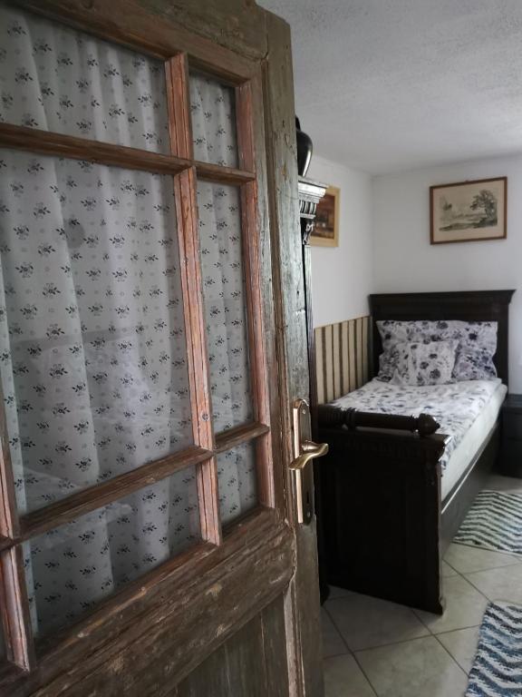 Postel nebo postele na pokoji v ubytování Berkó Vendégház