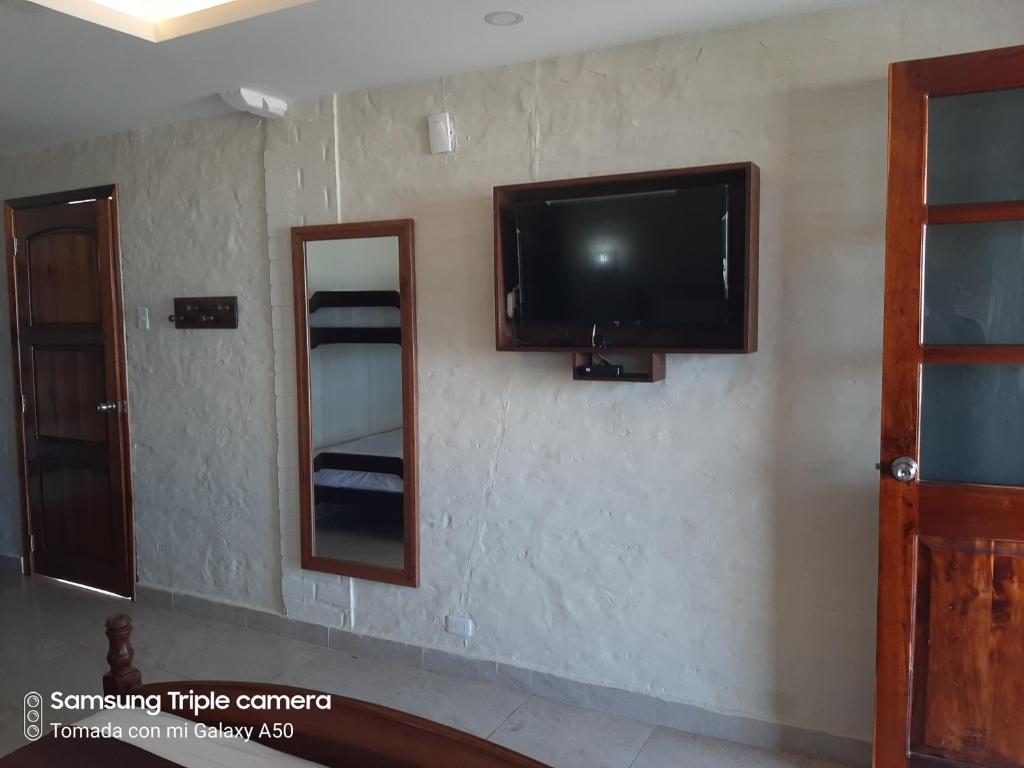 TV a/nebo společenská místnost v ubytování Hotel La Vista