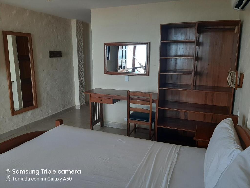 Postel nebo postele na pokoji v ubytování Hotel La Vista