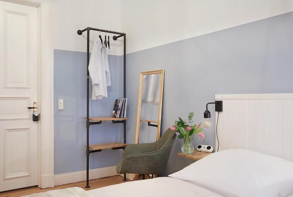 Postel nebo postele na pokoji v ubytování Hotel am Museum