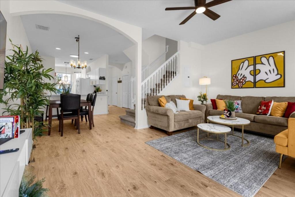 a living room with a couch and a table at 3 Bedroom 25 Bathroom Fiesta Key 4728Hh in Kissimmee