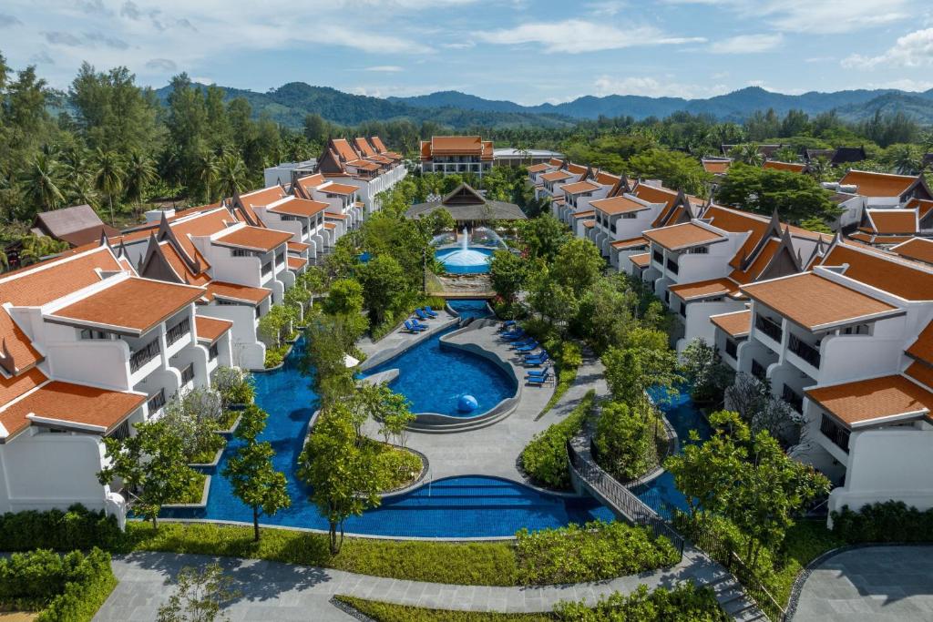 an aerial view of a resort with a pool at JW Marriott Khao Lak Resort Suites in Khao Lak