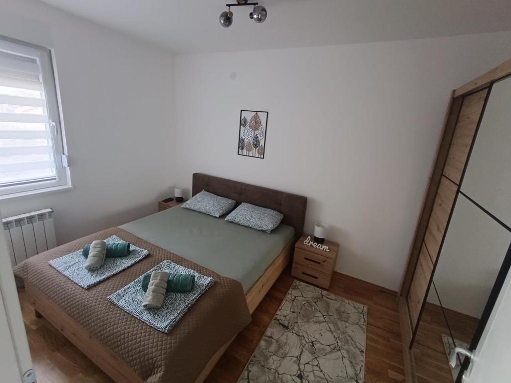 Postel nebo postele na pokoji v ubytování Apartment Eight - Pirot