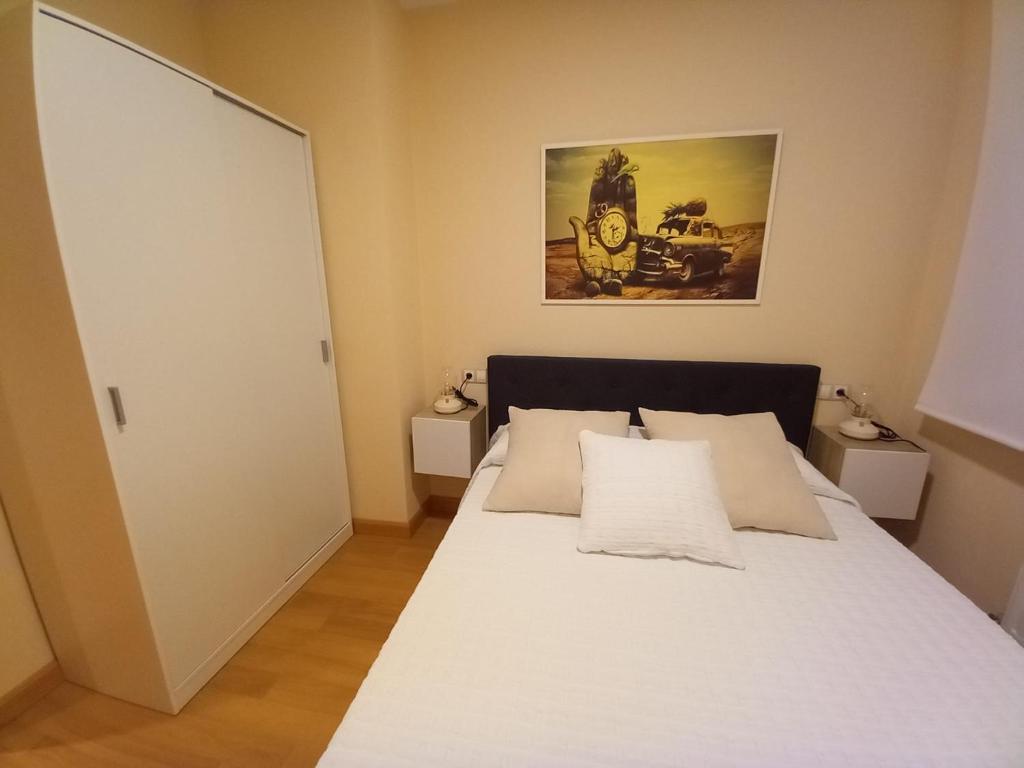 Postel nebo postele na pokoji v ubytování Apartamento Aurora