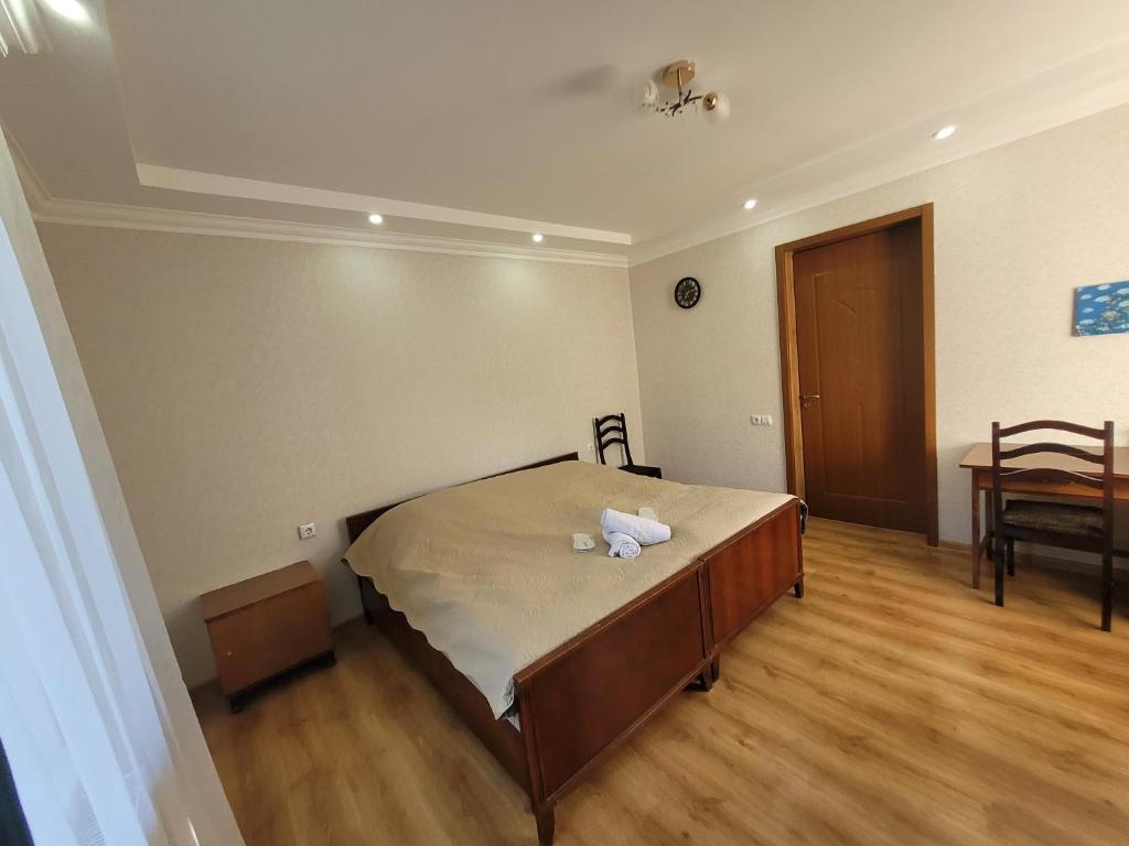 Postel nebo postele na pokoji v ubytování Family hotel mountain panorama