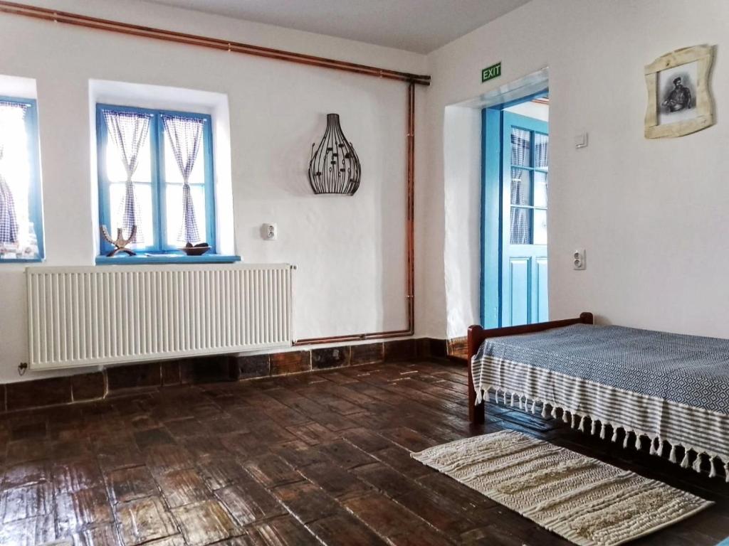Postel nebo postele na pokoji v ubytování Matejev konak