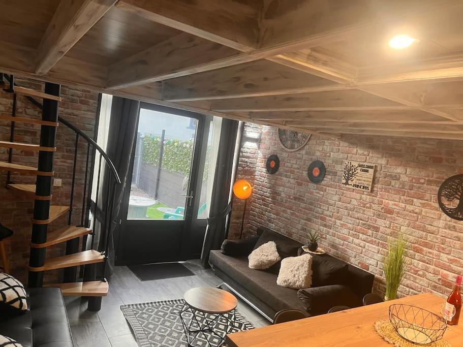 Posezení v ubytování Top Loft Perles 4 des Châteaux