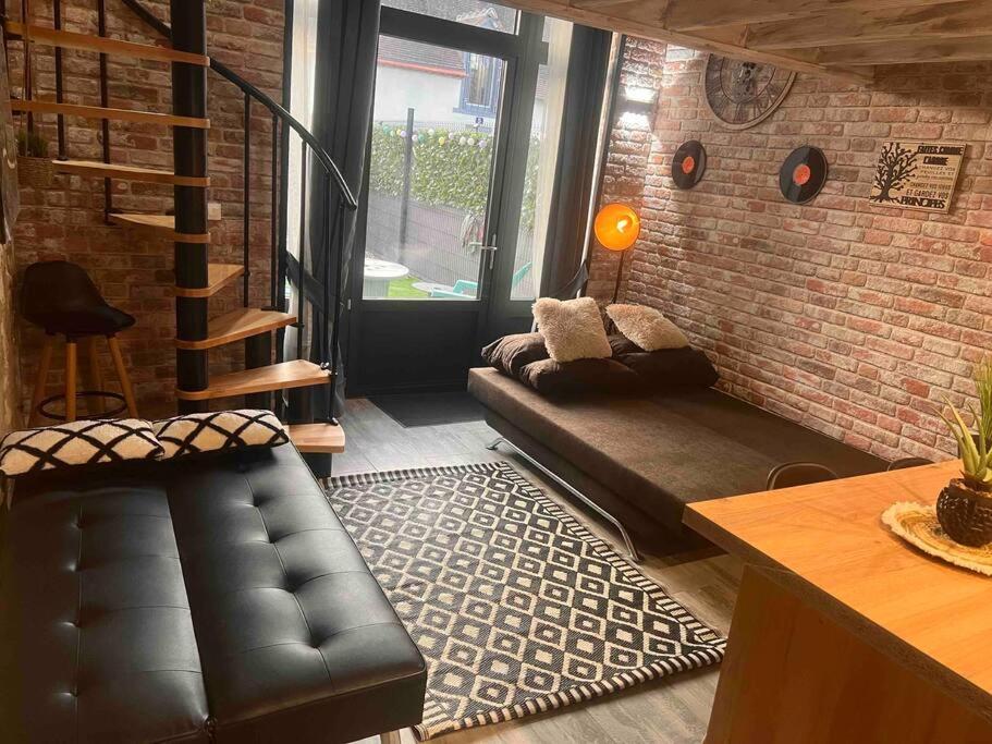 Posezení v ubytování Top Loft Perles 4 des Châteaux