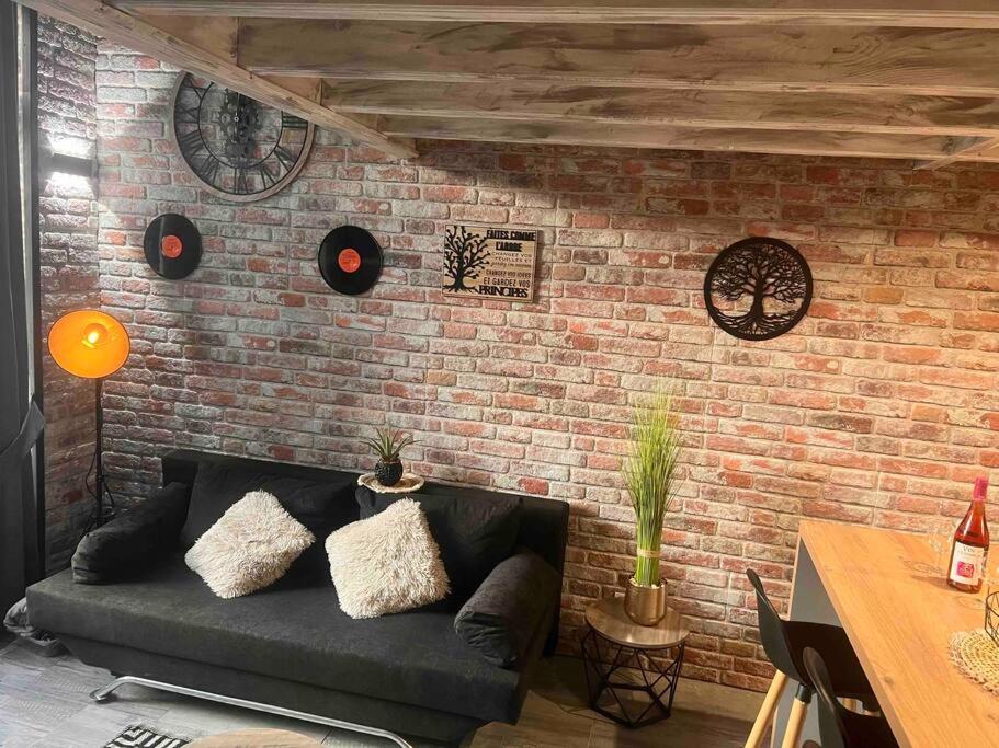 Posezení v ubytování Top Loft Perles 4 des Châteaux