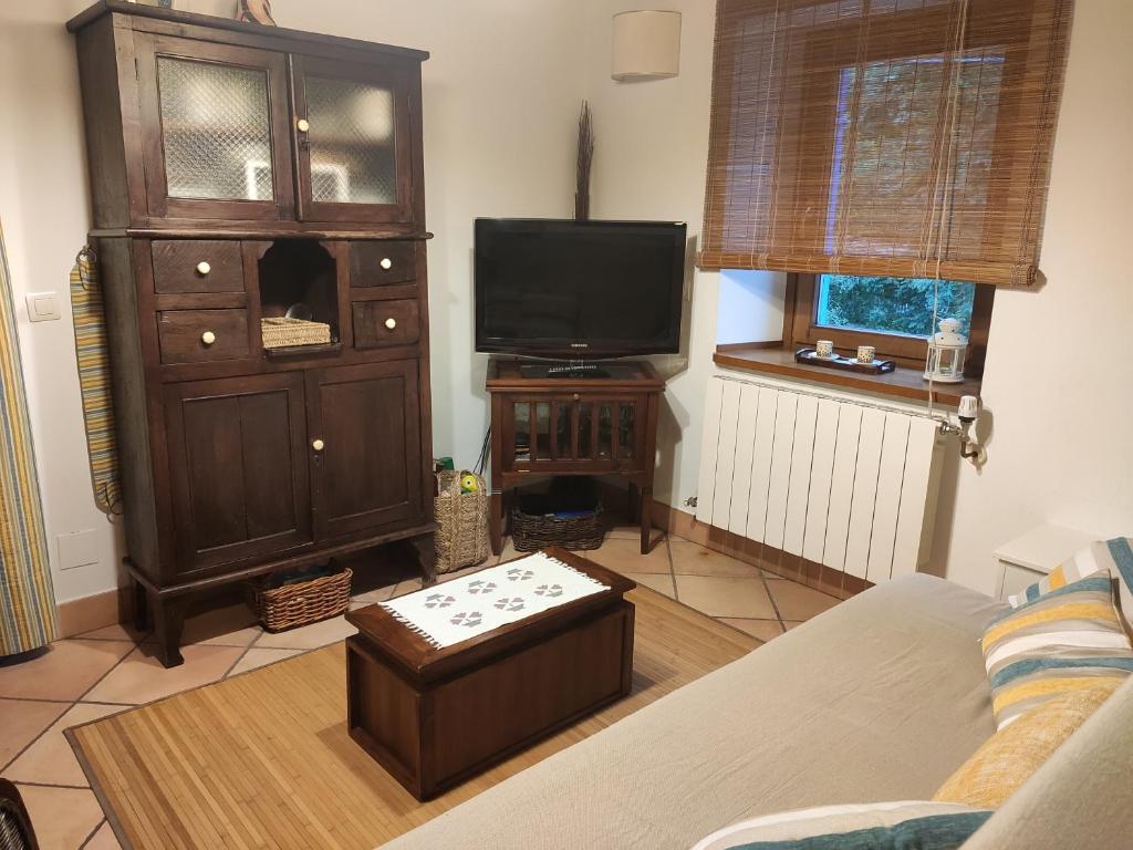 TV a/nebo společenská místnost v ubytování Apartamento Aguas del Sella