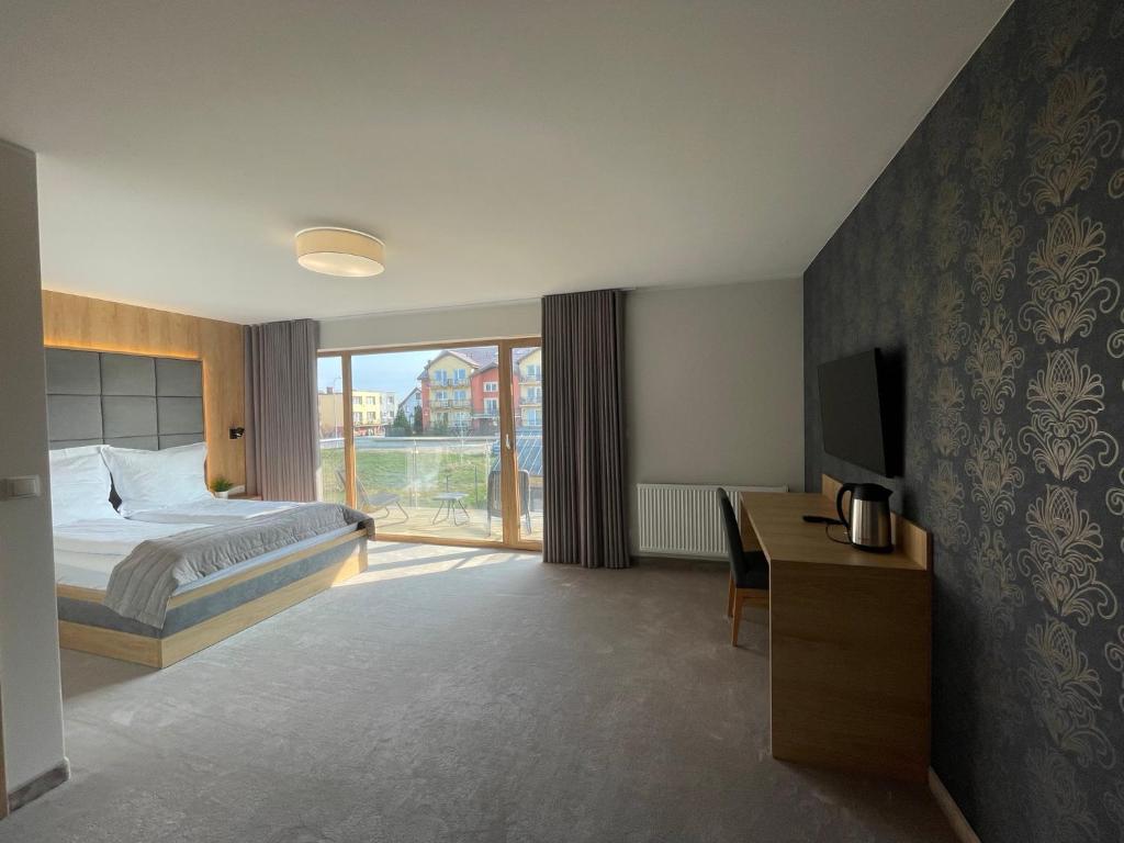 Postel nebo postele na pokoji v ubytování Sea Resort