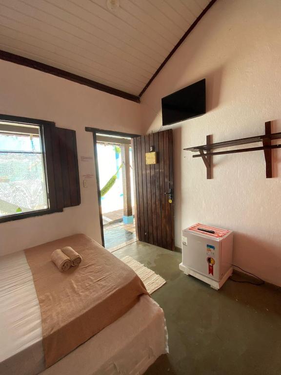 Postel nebo postele na pokoji v ubytování Pousada Dom Quixote
