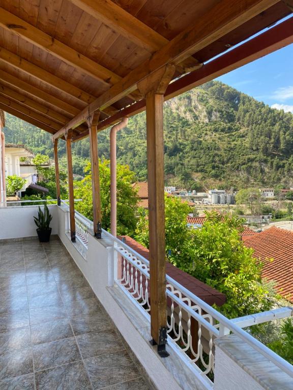 a balcony with a view of a mountain at Marl's Home in Berat