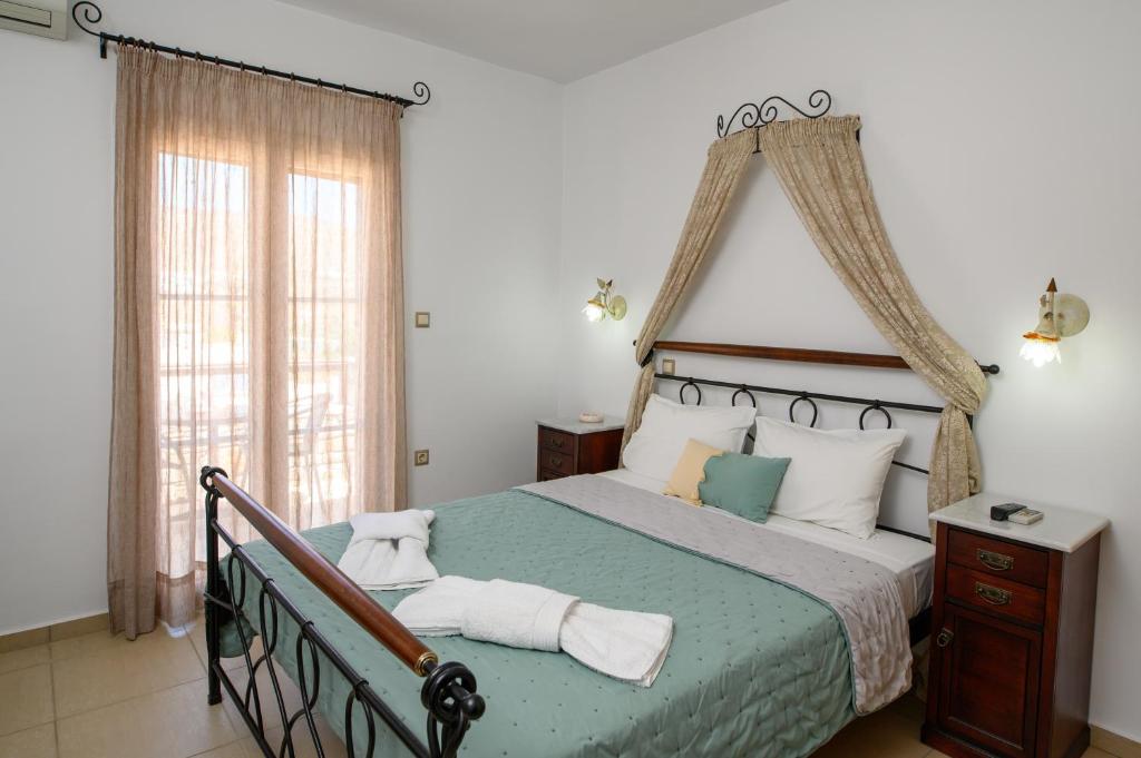 Katil atau katil-katil dalam bilik di Villa Andromeda