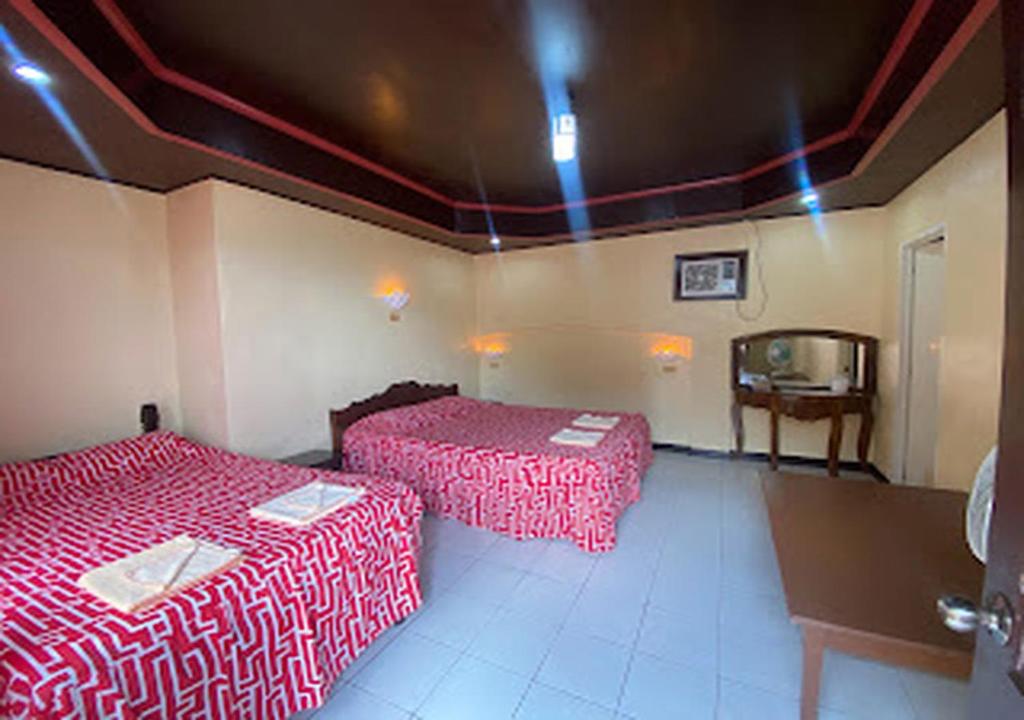 Postel nebo postele na pokoji v ubytování Napo Beach Resort