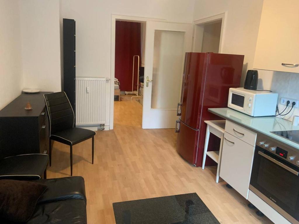 Kuchyň nebo kuchyňský kout v ubytování Apartament HOTEL LIMON