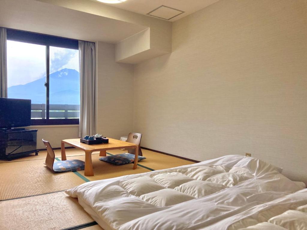 TV a/nebo společenská místnost v ubytování Shoji Mount Hotel