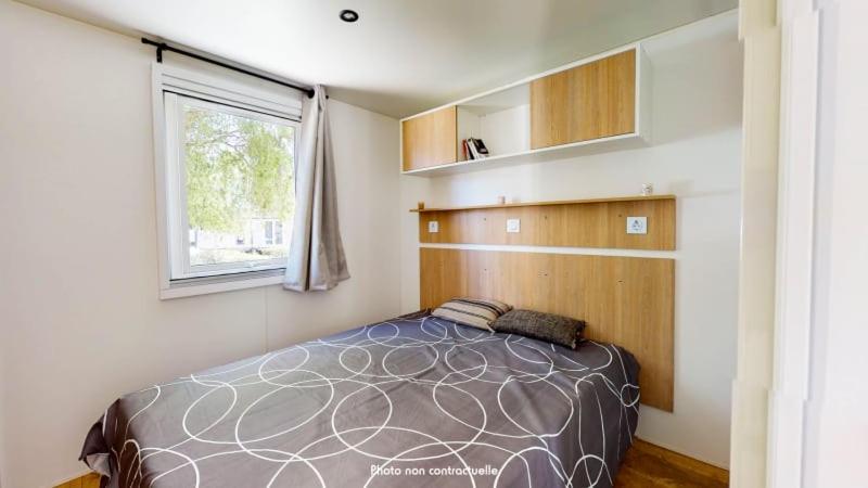 Postel nebo postele na pokoji v ubytování Camping Officiel Siblu Les Oyats