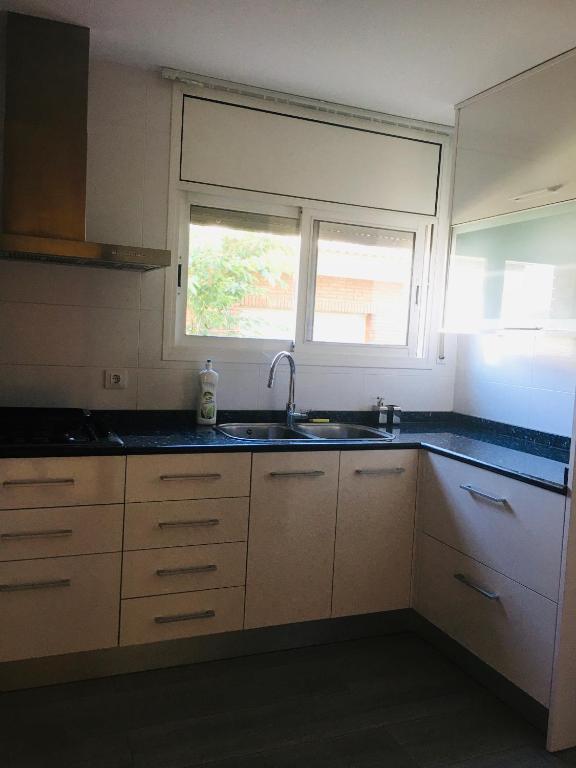 Kuchyň nebo kuchyňský kout v ubytování Casa de Aurora