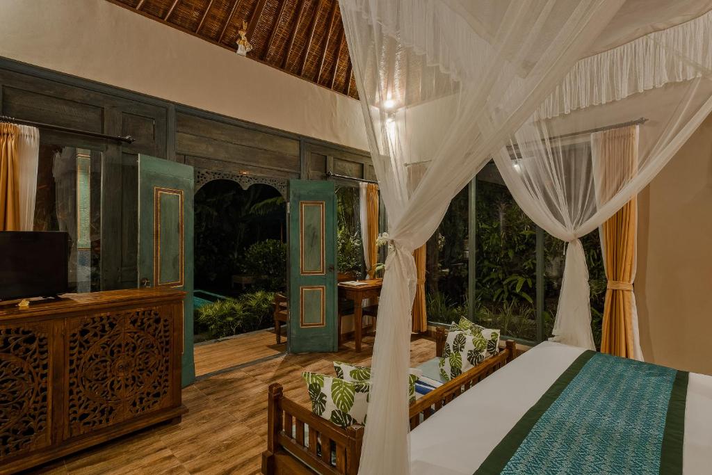 Letto o letti in una camera di Teja Lokha Ubud Villa